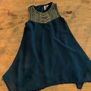Beautiful little girls sleeveless tunic.